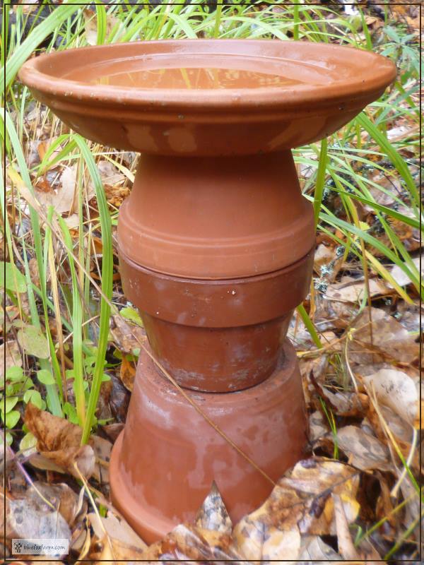  Clay Pot Bird Bath  simple and the birds love it