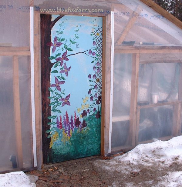 Greenhouse Door painted with flowers on a trellis