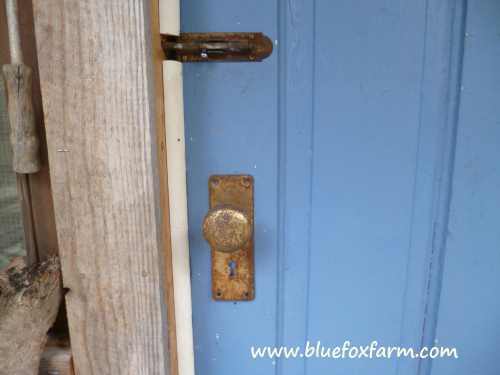 The Eggporeum door has upcycled vintage hardware