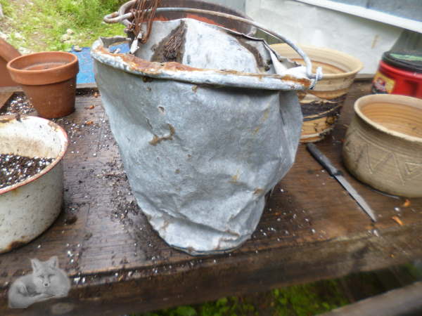 The side view of the old bucket