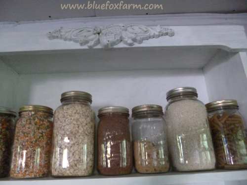 The jars hold staples like oats, rice and soup mix...