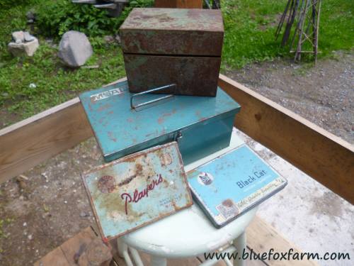A collection of blue vintage tins
