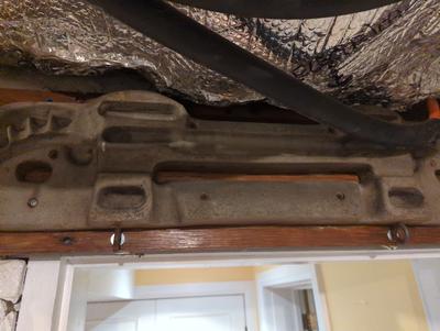 Strange object attached to floor joist