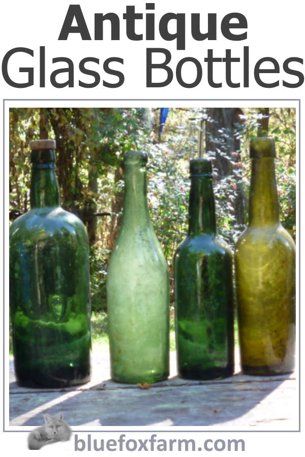 Antique Glass Bottles; vintage and collectible add sparkle to shady dark corners in your garden, brightening and reflecting the sunshine...