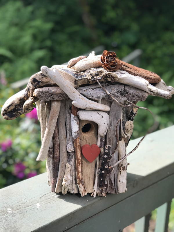 Driftwood embellished bird house