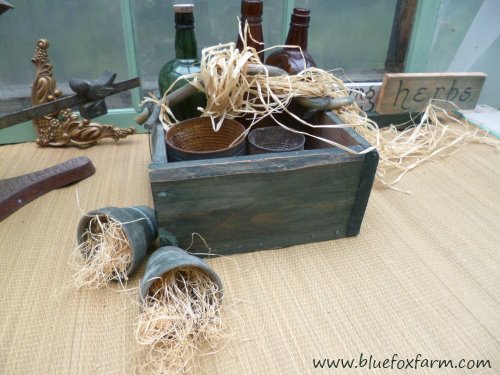 Twig handles are a fun way to decorate a plain green box...