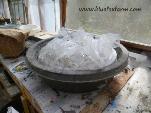 The mold lined with poly film for the hypertufa millstone