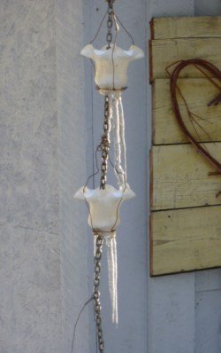 Rain Chains add so much charm to a rustic shed