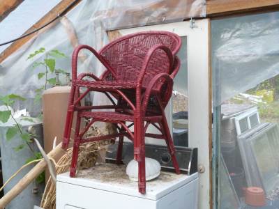 Old wicker chairs that someone painted red - it wasn't me!