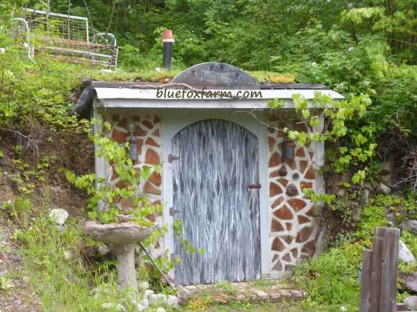 Glory Be, the Root Cellar, with 'barnboard' painted door