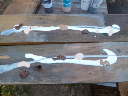 Painting the old fence boards...