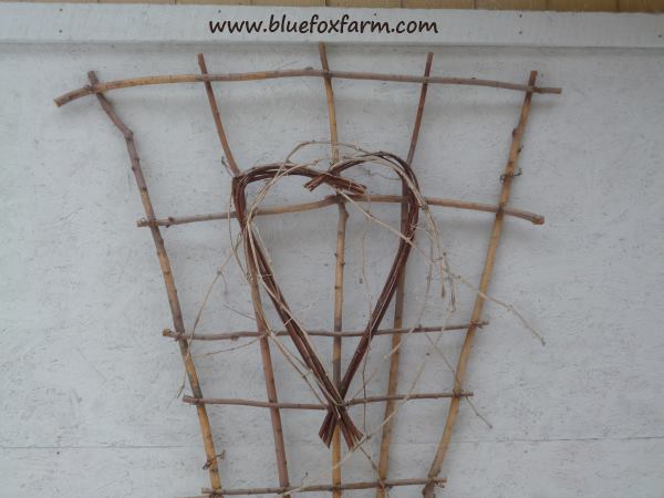A twiggy heart decorates the Twig Fan Trellis - want one?  Look here...
